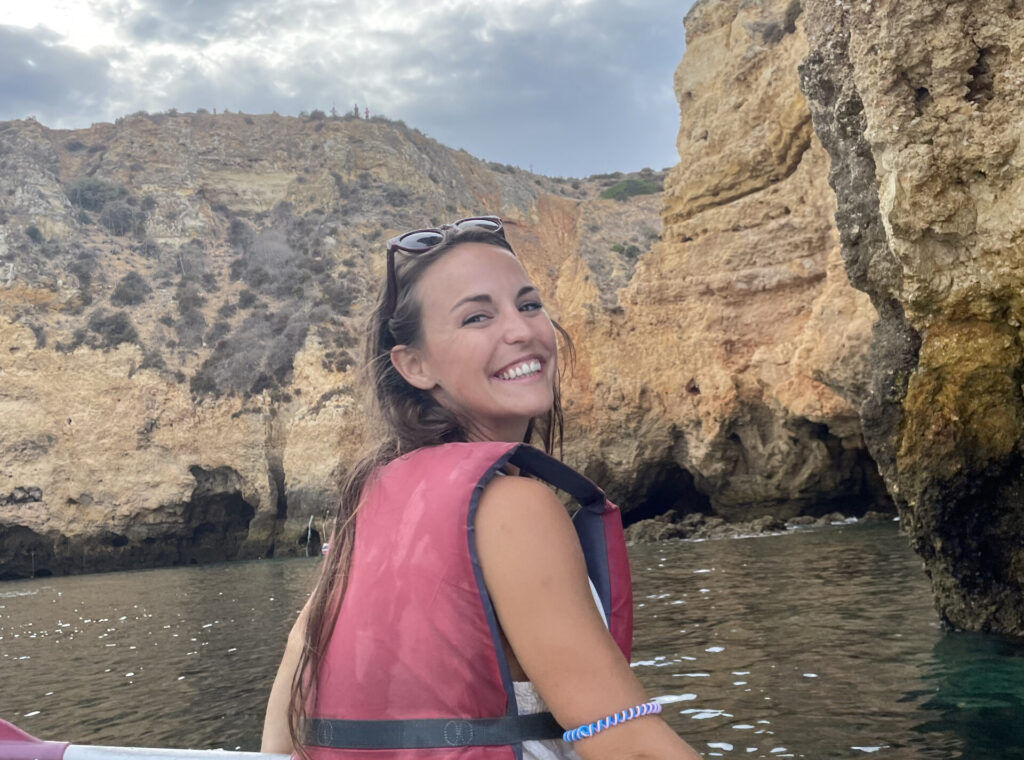 girl kayaking wearing life jacket